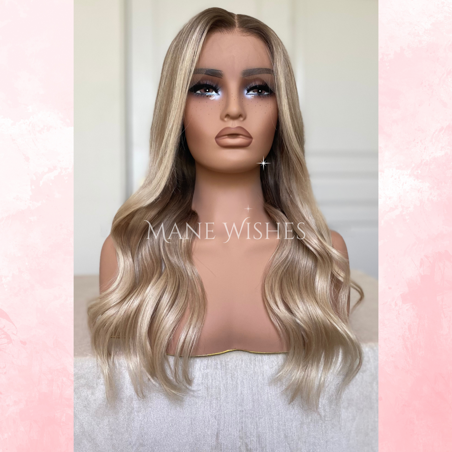 Mannequin head with blonde wig on a pastel background, featuring the brand 'Mane Wishes'.