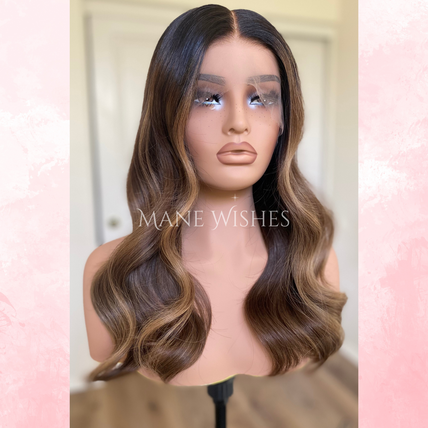 Mannequin head with a brown wig on a blurred background with 'Mane Wishes' branding.