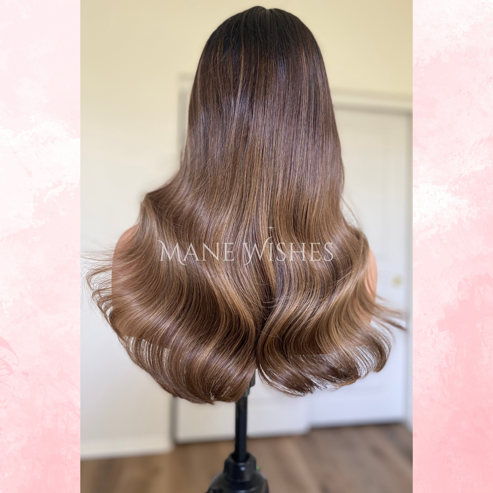 Mannequin head with brown hair styled in waves, branded 'Mane Wishes'.