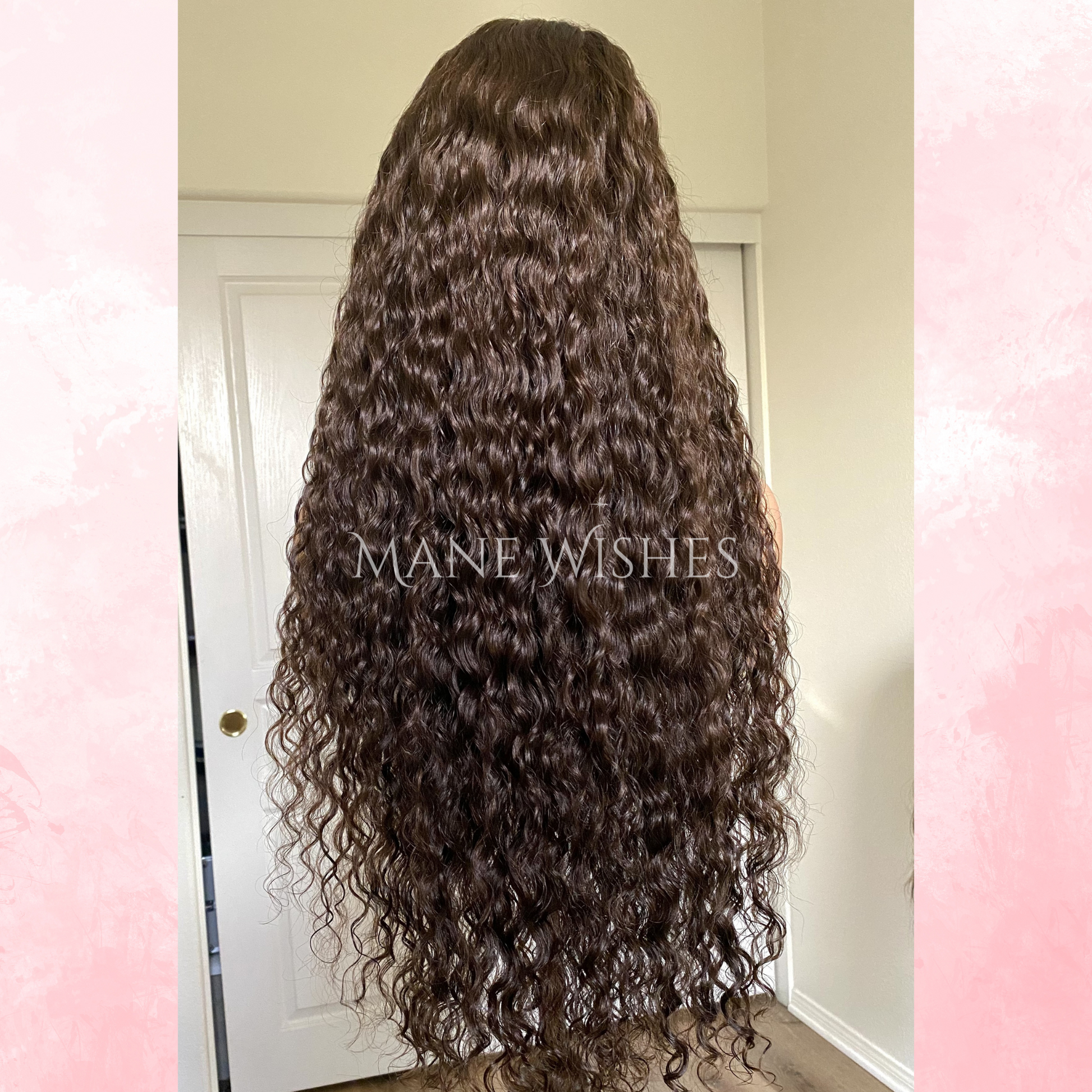 Curly hair extension with 'Mane Wishes' branding against a neutral background