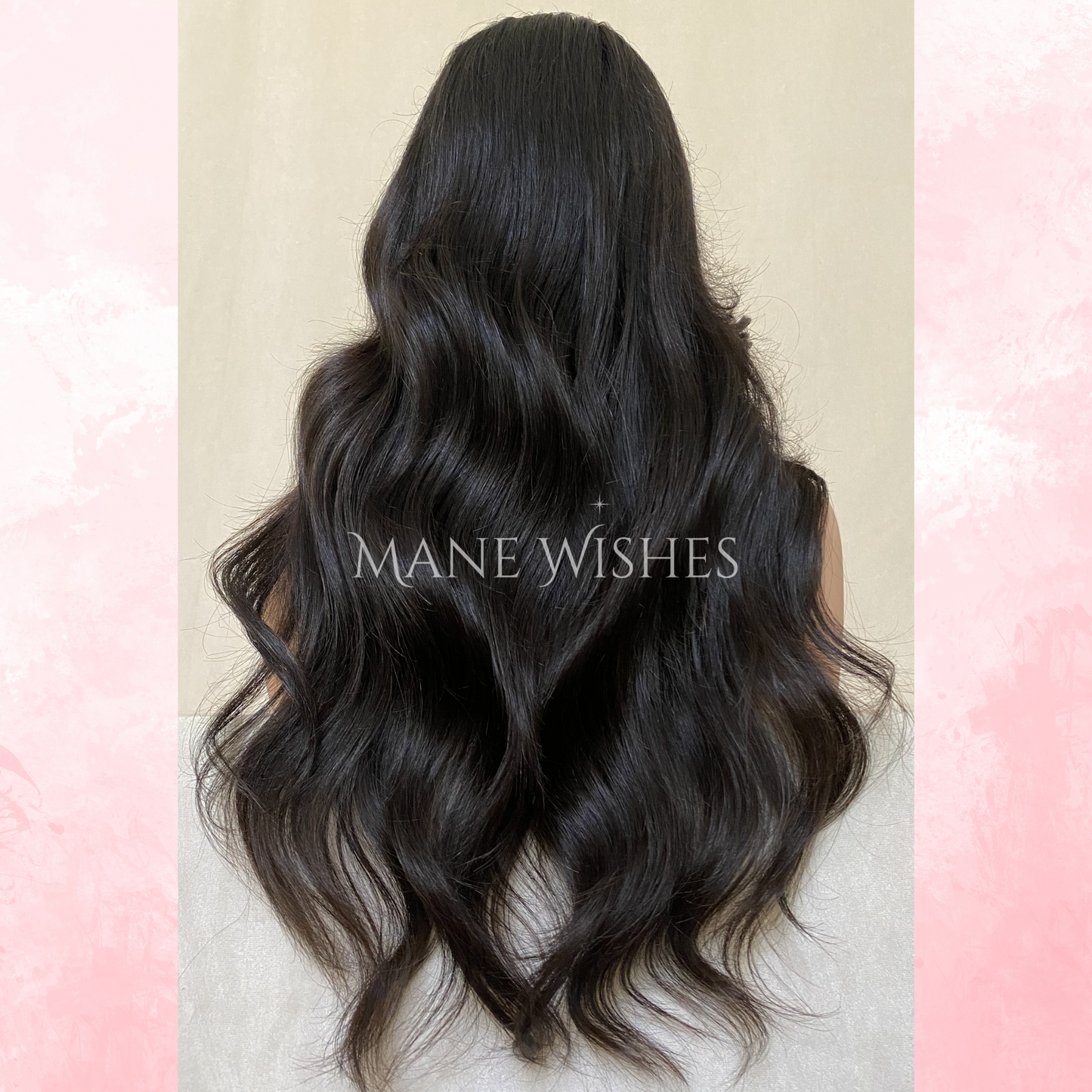 Black wavy hair extension on a neutral background with 'Mane Wishes' branding.