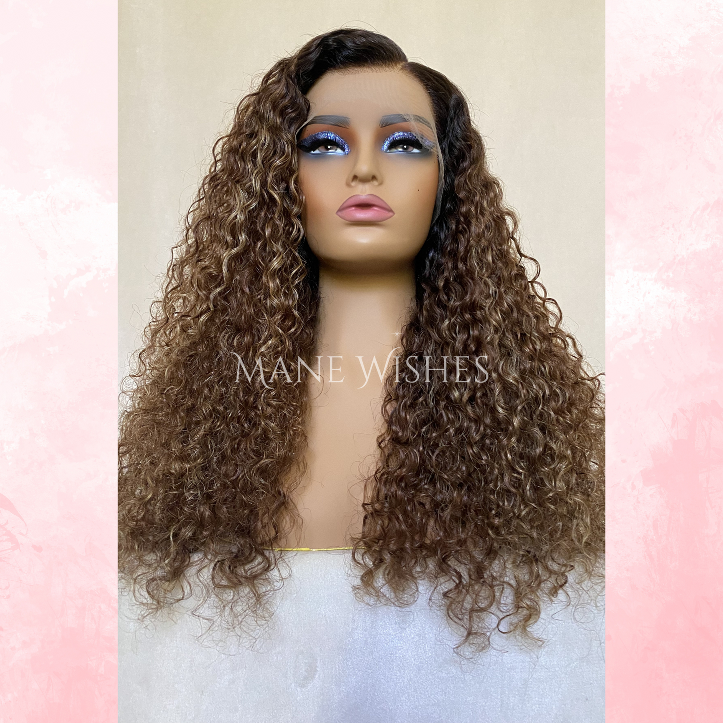 Mannequin head with long, wavy brown wig on a pastel pink and beige background, branded 'Mane Wishes'.