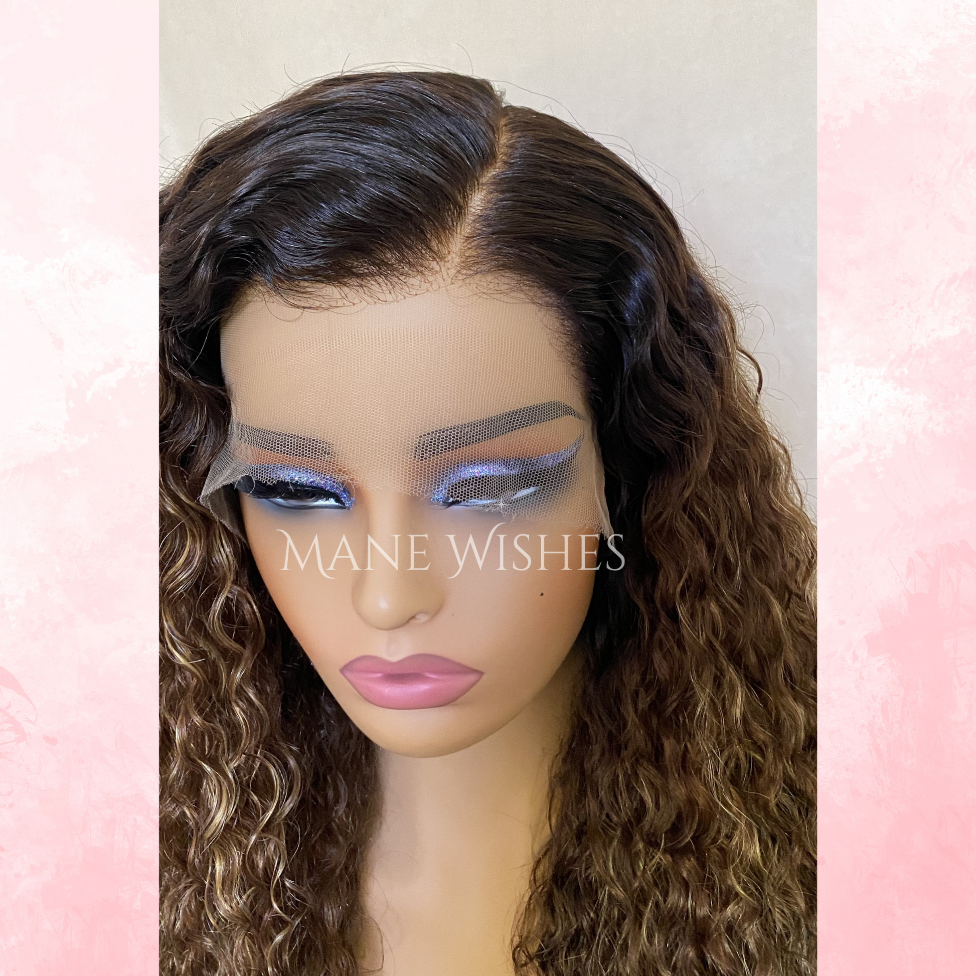 Mannequin head with wavy brown hair and 'Mane Wishes' branding.