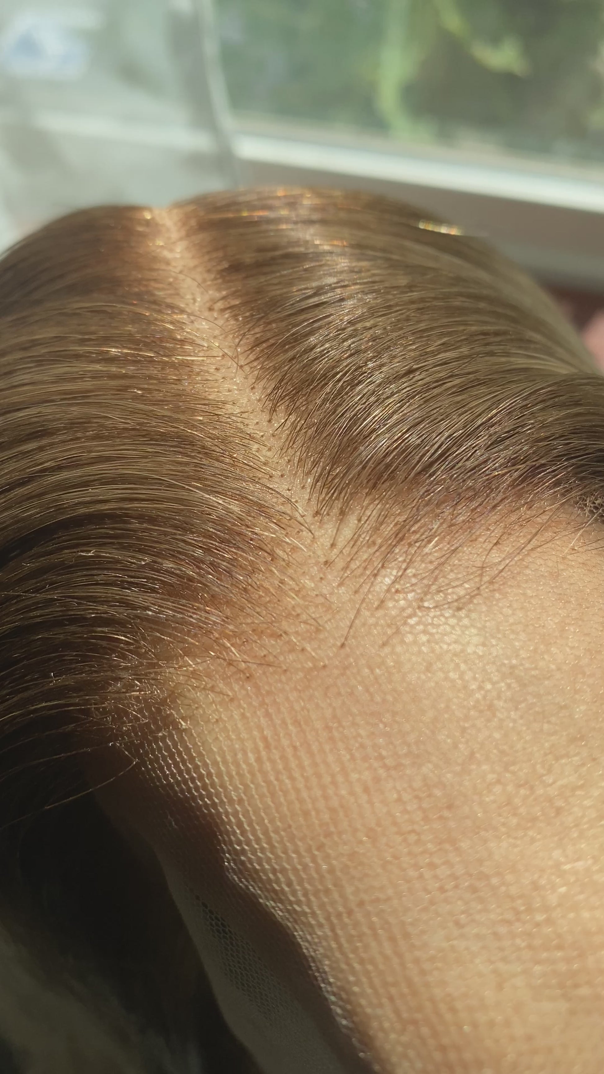 Mannequin head with blonde wig, branded 'Mane Wishes'.