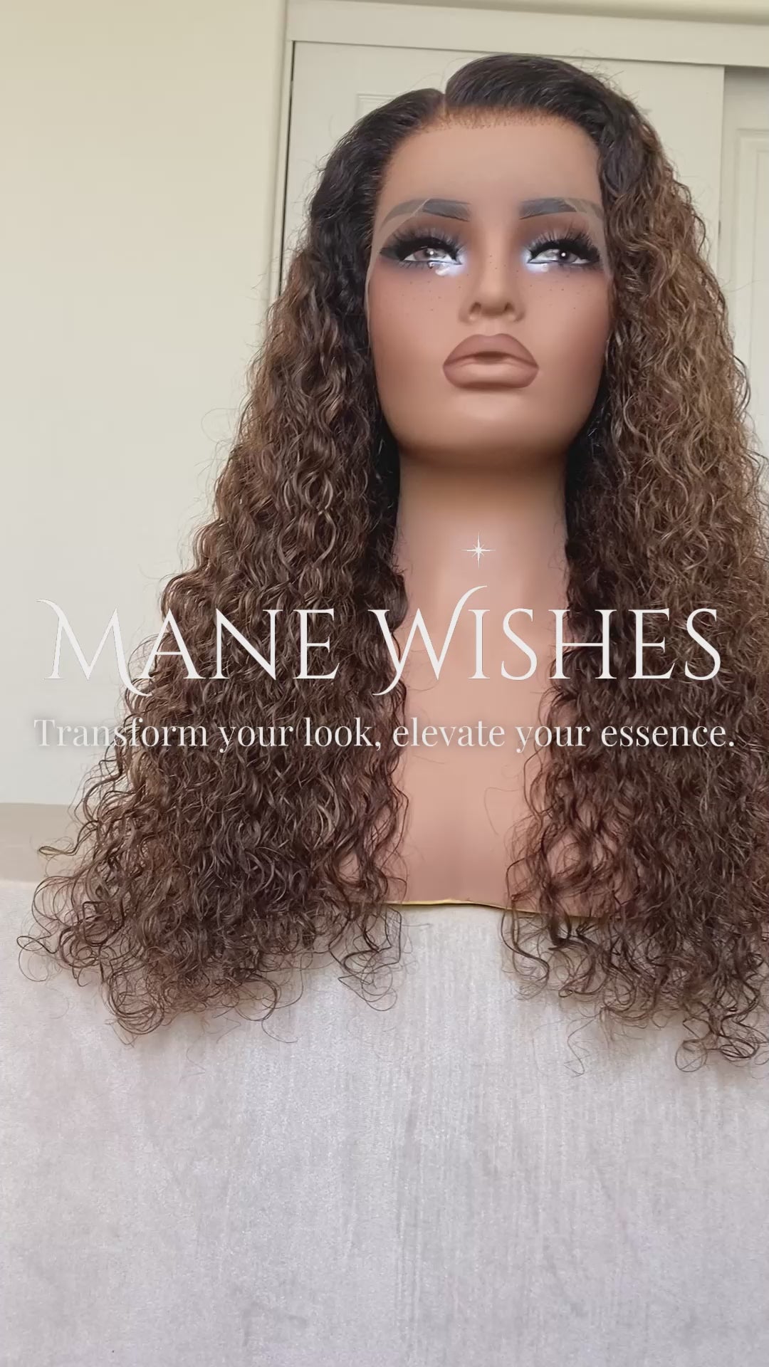 Mannequin head with wavy brown hair and 'Mane Wishes' branding.