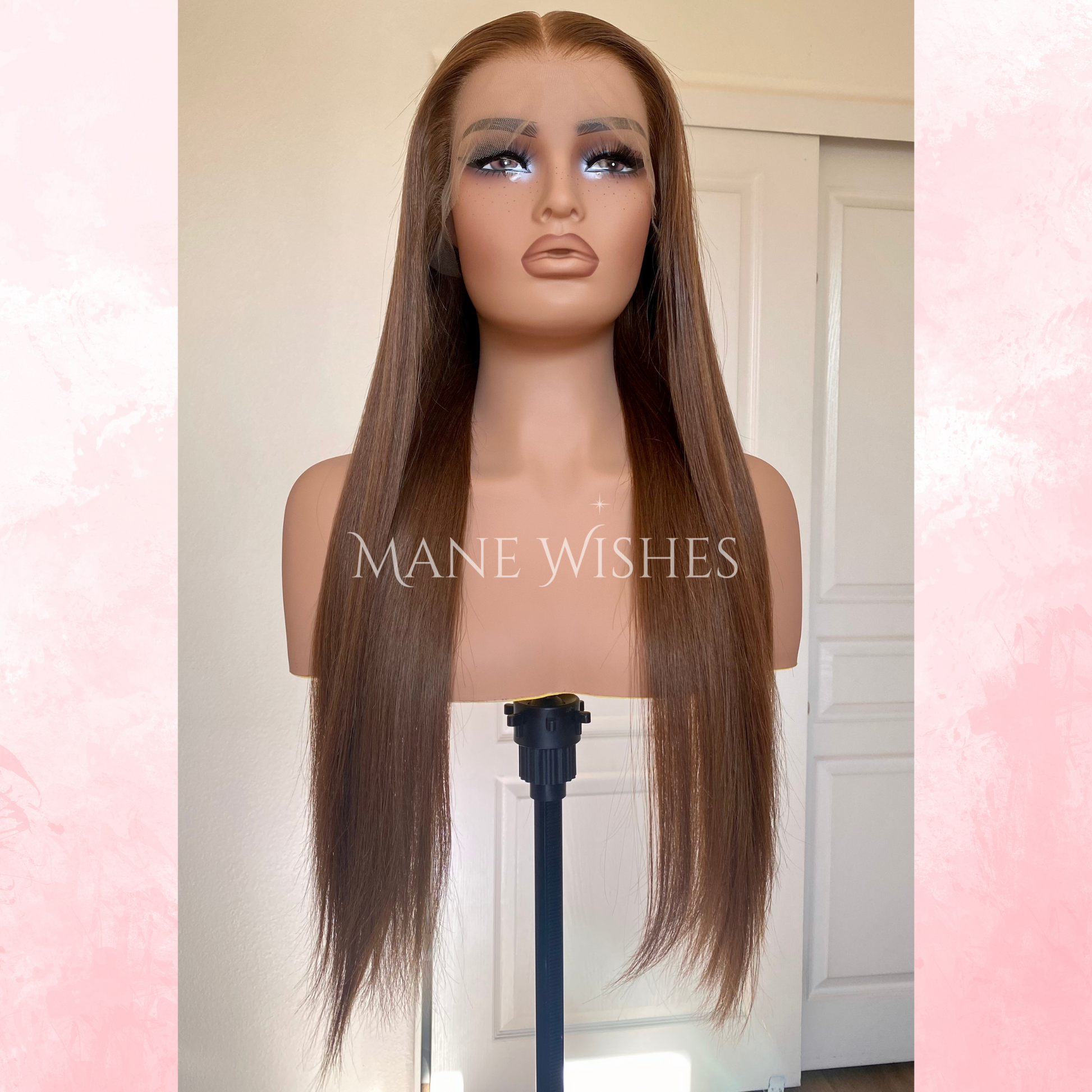 Mannequin head with long brown wig on a white background, branded 'Mane Wishes'.